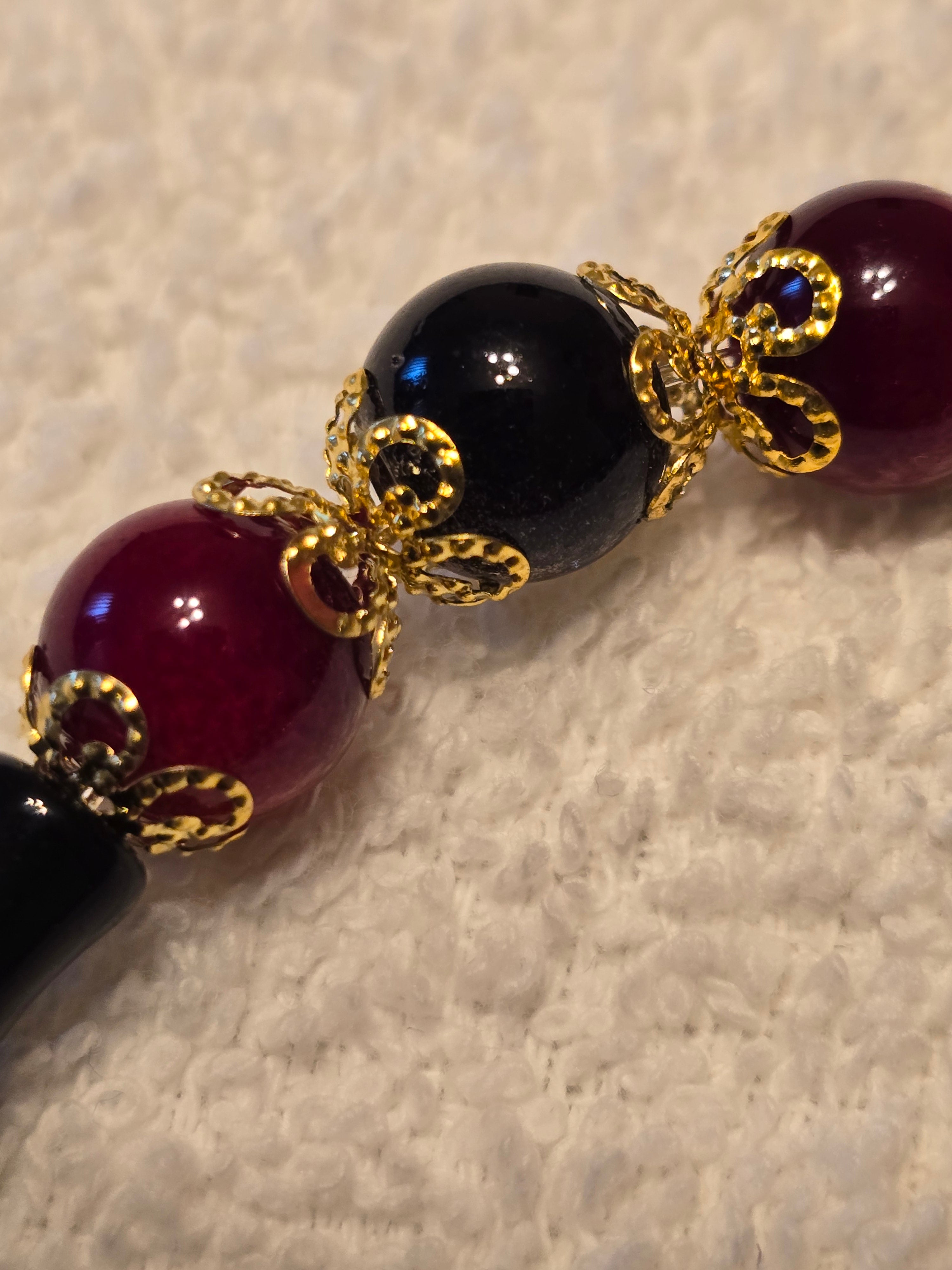 Black and Red Glass Bead with Gold Accents